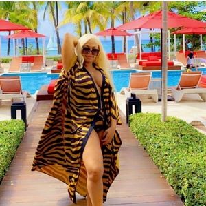 FEROCIOUS TIGER BADDIE 🐯💖💖Gold and black beach poncho from Akira worn once